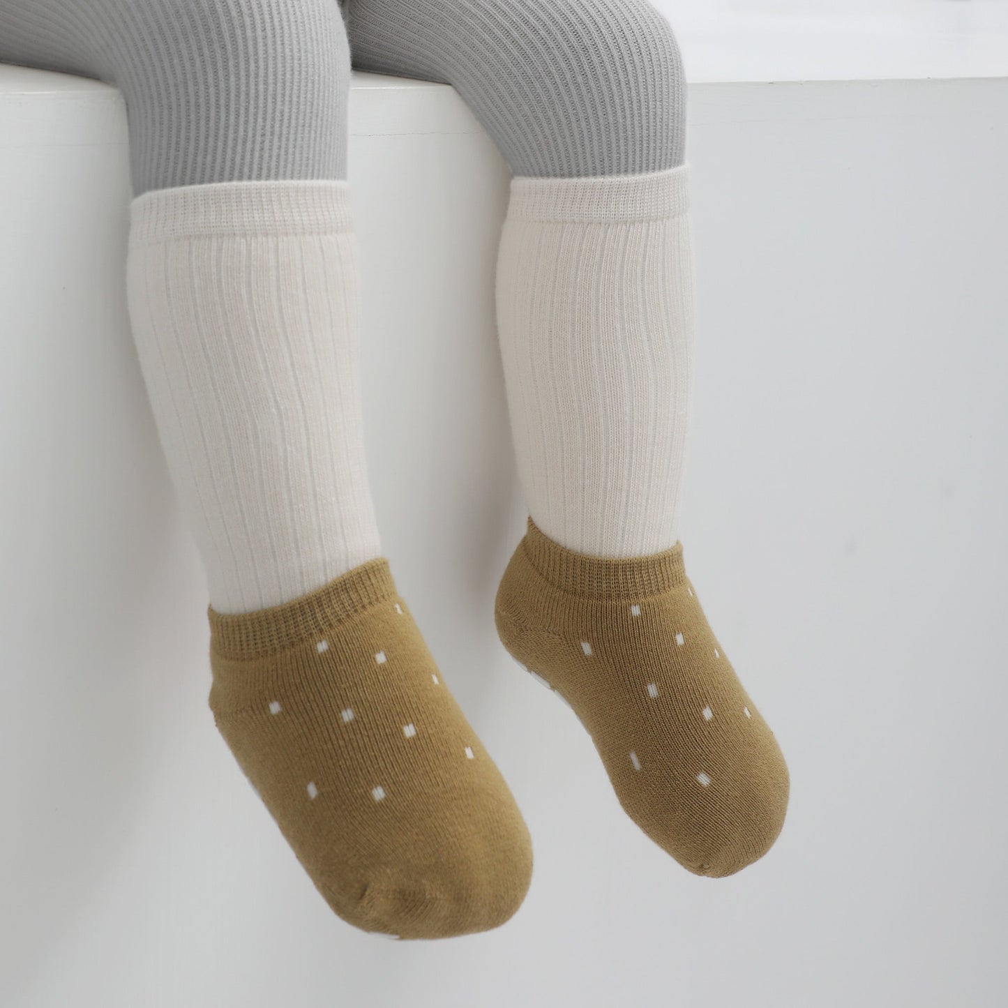 Warm Paws - 4 Pares de calcetines antideslizantes para bebés y niños pequeños